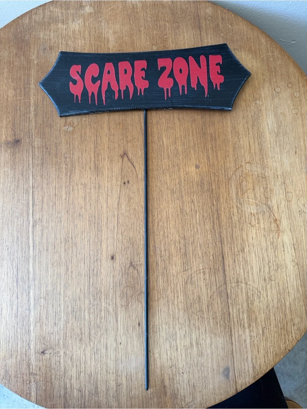 Spirit Halloween black 'Scare Zone' Yard Sign with Red Lettering